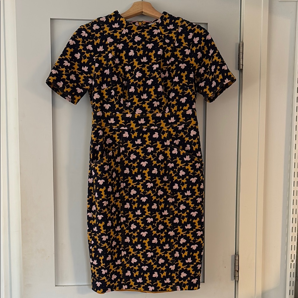 Boden floral navy blue, gold and pink flower brocade dress. Has pockets.